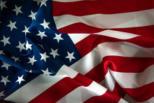Close-up Of Ruffled American Flag, Light Painted Background - USA