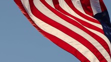 Close Up American Flag With Back Light - Slow Motion.