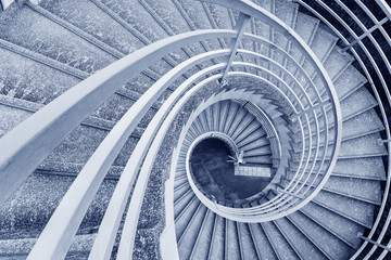 Poster - Empty modern spiral stairway, viewed from top