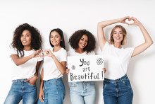 Women Multiracial Friends Holding Blank With Compliments Text.