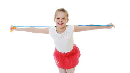 Sticker - Little girl posing in the studio. Close-up.