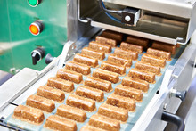 Production Of Confectionery On Conveyor