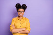 © deagreez - Photo of amazing pretty dark skin lady holding arms crossed positive working corporate mood wear specs yellow shirt isolated purple color background