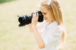 © Pavel - young girl takes camera outdoors , child with a camera