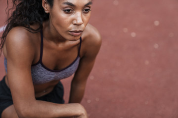 Poster - Tired african fitness woman resting