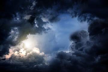 Wall Mural - cloudscape with a light