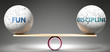 Fun and discipline in balance - pictured as balanced balls on scale that symbolize harmony and equity between Fun and discipline that is good and beneficial., 3d illustration