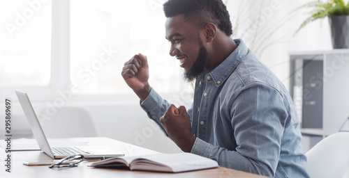 Fotografía Happy African American Freelancer Celebrating Successful Online Interview