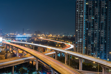 Twilight view city-scape commercial modern building and condominium in Rama 9 road Intersection area, Bangkok ,Thailand