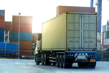 Cargo white Container truck in ship port Logistics.Transportation industry in port business concept.import,export logistic industrial Transporting Land transport on Port transportation storge