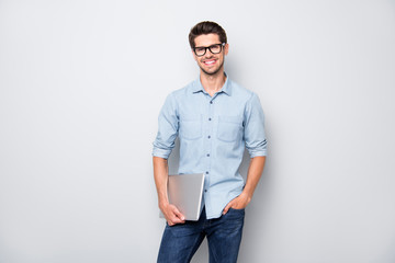 Fototapete - Photo of cheerful positive creative manager holding laptop with hands smiling toothily standing confidently showing his being successful isolated over grey color background