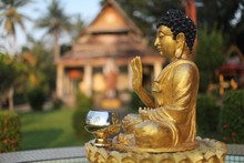 Closeup Of A Golden Buddha Statue In A Thai Temple In Malaysia