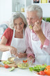 © aletia2011 - Close up portrait of senior couple cooking