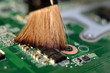 cleaning the electronic Board with braun brush