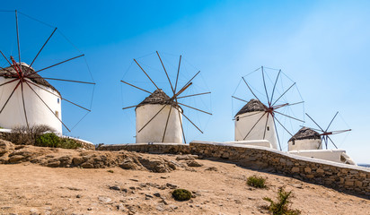 Wall Mural - Traditional whitewashed windmills in Mykonos town, Greece.