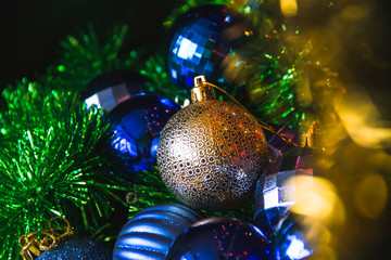 Christmas balls. Background of bright light tinsel