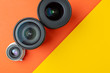 © Богдан Маліцький - three photo lenses, on a colored background, a set of photo devices for the camera
