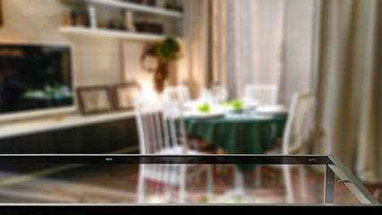 Wall Mural - glass table top with blurred luxury home interior. table background with empty space for products an