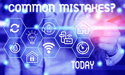 Text sign showing Common Mistakes Question. Business photo showcasing repeat act or judgement misguided making something wrong Female human wear formal work suit presenting presentation use smart