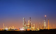 © JT Jeeraphun - Panorama wide-angle Large oil and gas refinery industrial area at night