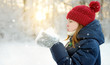 © MNStudio - Adorable young girl having fun in beautiful winter park. Cute child playing in a snow. Winter activities for family with kids.