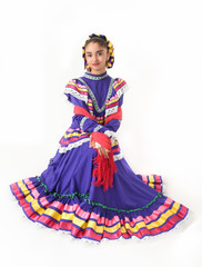 Wall Mural - niña latina mexicana con traje de danza folklorica en color morado jalisco mexico