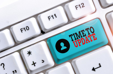 Wall Mural - conceptual hand writing showing time to update. concept meaning act updating something someone or up