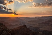 High Angle Shot Of Sun Rays Spreading Over The Grand Canyon, USduring Sunset