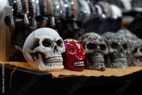 Fotomural There are several skulls on the table.