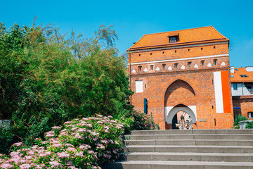 Old town Brama Klasztorna gate in Torun, Poland