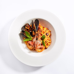 delicious spaghetti with seafood and tomatoes