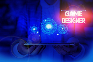 Handwriting text writing Game Designer. Conceptual photo Campaigner Pixel Scripting Programmers Consoles 3D Graphics Woman wear formal work suit presenting presentation using smart device