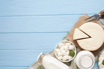 Wall Mural - Copy space with dairy products on chopping board