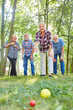 © Robert Kneschke - Group of seniors playing bocce or boules