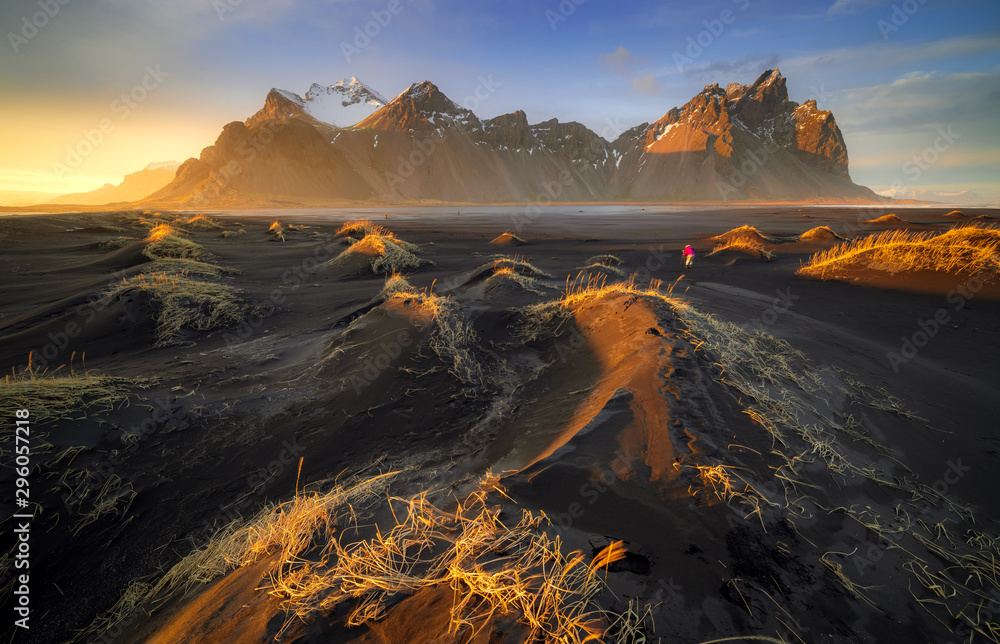 Vestrahorn mountain with black volcanic lava sand dunes at sunset, Stokksnes, Iceland - obrazy, fototapety, plakaty 