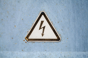 High voltage warning triangle sign