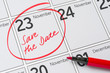 Save the Date written on a calendar - November 23