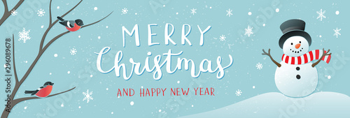 Cuadros en Lienzo Winter holidays or Christmas background with snowman and snowflakes