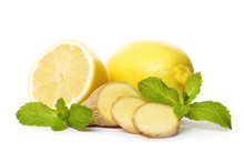 Composition Of Lemon Ginger And Mint Leaves On A White Background.