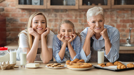 Wall Mural - Happy loving family are making pastry together