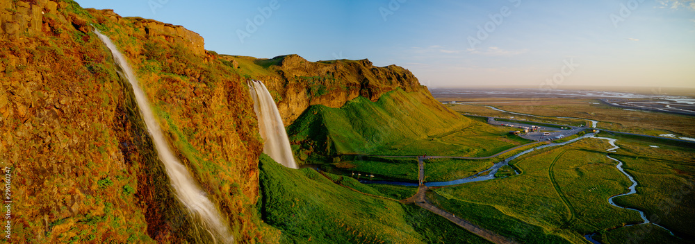 Beautiful Seljalandsfoss waterfall in Iceland during Sunset, Europe - obrazy, fototapety, plakaty 