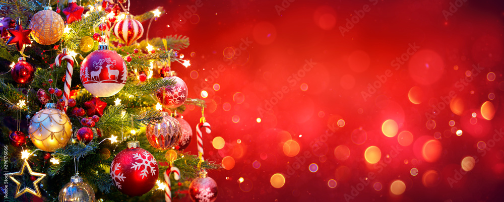 Christmas Tree With Ornament And Bokeh Lights In Red Background - obrazy, fototapety, plakaty 