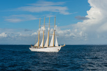 Sailing Ship With Four White Sails