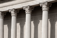 Vintage Old Justice Courthouse Column. Neoclassical Colonnade With Corinthian Columns As Part Of A Public Building Resembling A Greek Or Roman Temple
