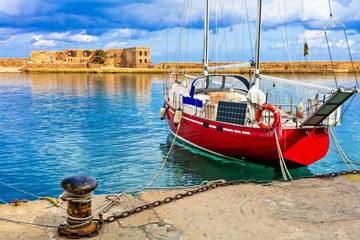 Sticker - red sailing boat in old town of Chania, Crete islad, Greece