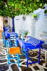 Wall Mural - Traditional Greece - small tavernas in Cyclades. Naxos island. retros tyled picture