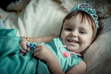 Wall Mural - girl in a princess crown on her head