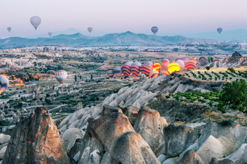 Wall Mural - Ignition and take-off of balloons in Cappadocia