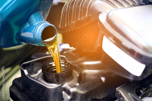Cuadros en Lienzo Refueling and pouring oil quality into the engine motor car Transmission and Maintenance Gear