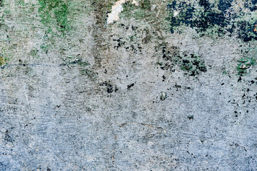 Texture of a concrete wall with cracks and scratches which can be used as a background